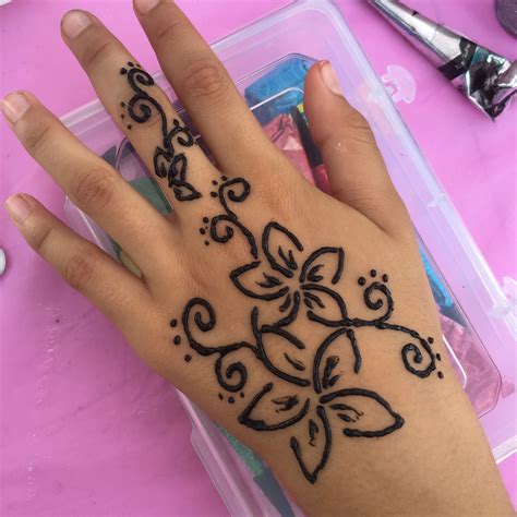 Cute Henna Flower Design on Hand