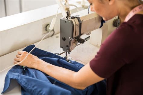 Female Tailor Using Sewing Machine Stock Photo - Image of working, work ...