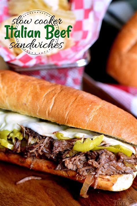 Load up on the delicious flavor of these Slow Cooker Italian Beef Sandwiches! A handful of ...