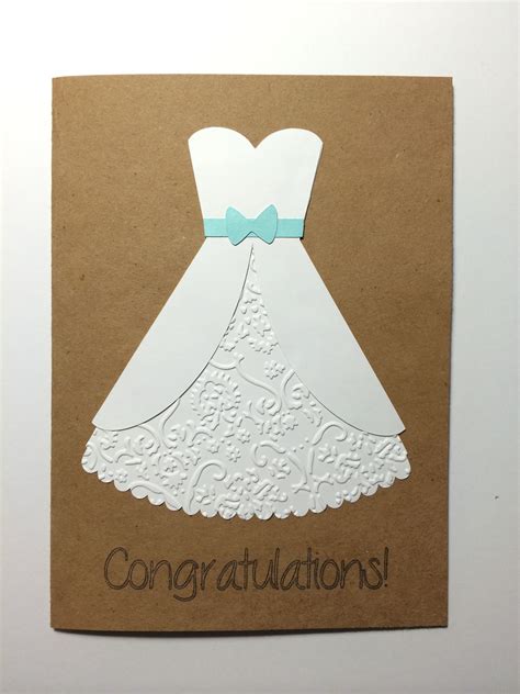 a card with a white dress on it and congratulations written across the ...