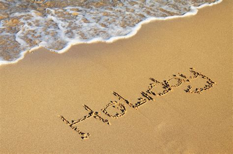 Word Holiday In Sand Free Stock Photo - Public Domain Pictures