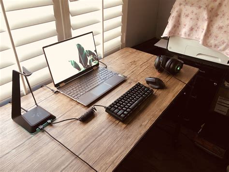 Clean Laptop Setup on Wooden Desk