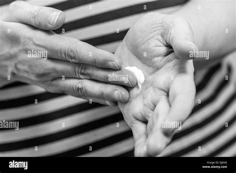 Cosmetics mature Black and White Stock Photos & Images - Alamy