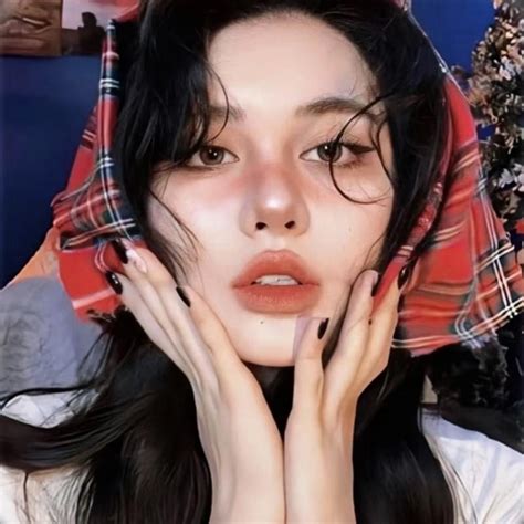 The crystal chandelier above the dining table cost more than most