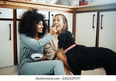 7+ Hundred Women Dog Kitchen Royalty-Free Images, Stock Photos