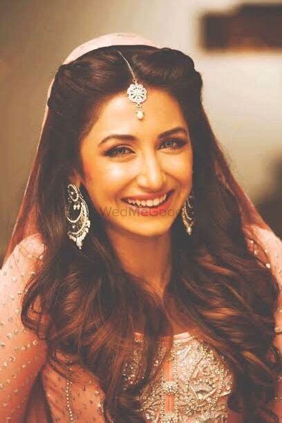 glowy bridal makeup  open hair indian hairstyles indian wedding