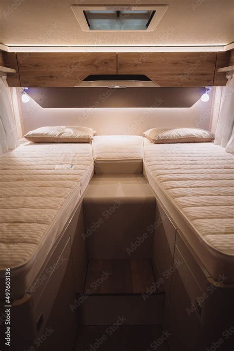 Bed inside a new luxury camper van motorhome Stock Photo | Adobe Stock