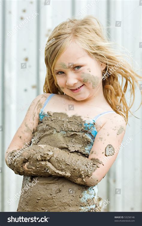 Happy Young Girl Playing In The Mud Stock Photo 53258146 : Shutterstock