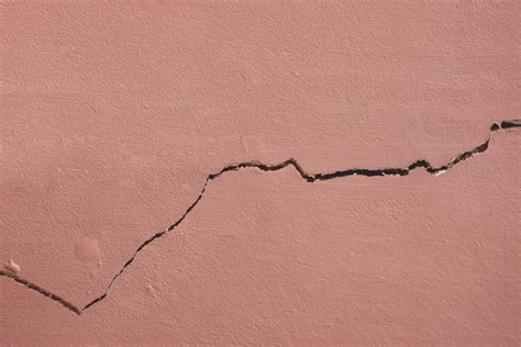 Background and texture of horizontal crack line on surface of brown ...