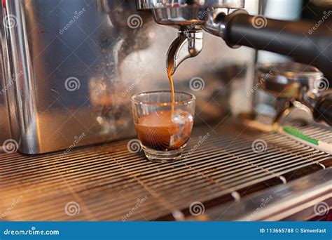 Espresso Shot at the Machine Stock Photo - Image of caffeine, brown: 113665788