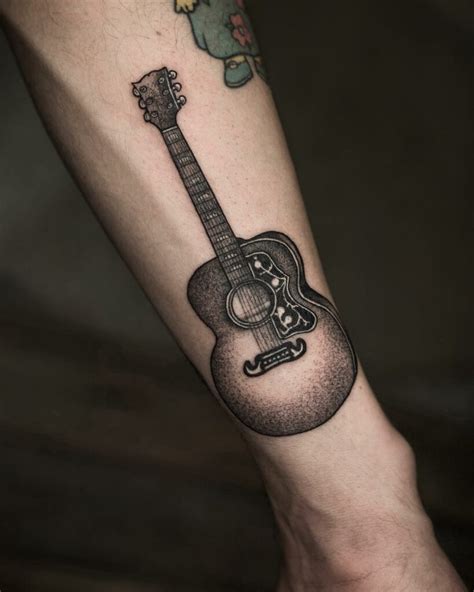 11+ Simple Guitar Tattoo Designs That Will Blow Your Mind!