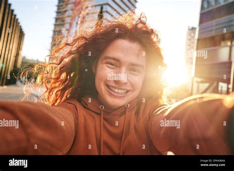 binary gender person poses cheerfully photo