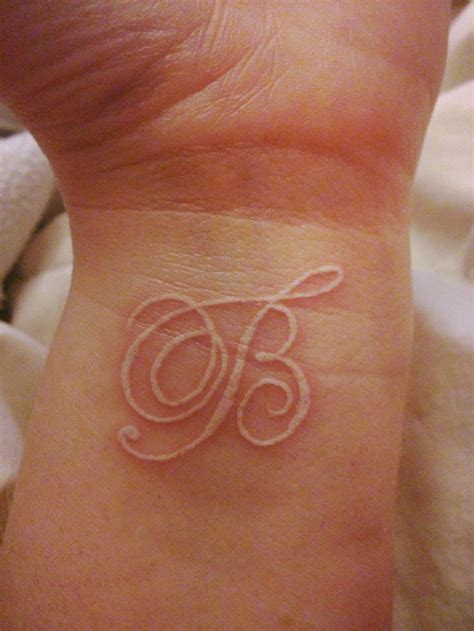 initial tattoos for females 2