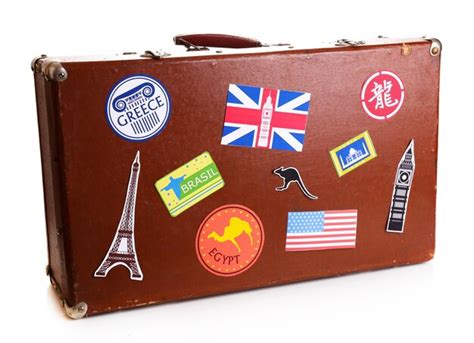 Premium Photo | Suitcase with stickers isolated on white