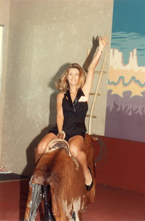 Florida Memory • Woman riding a mechanical bull.