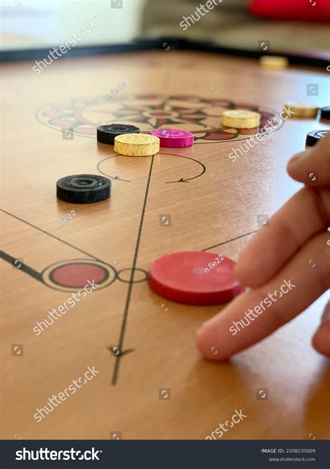2+ Thousand Carom Playing Royalty-Free Images, Stock Photos & Pictures ...
