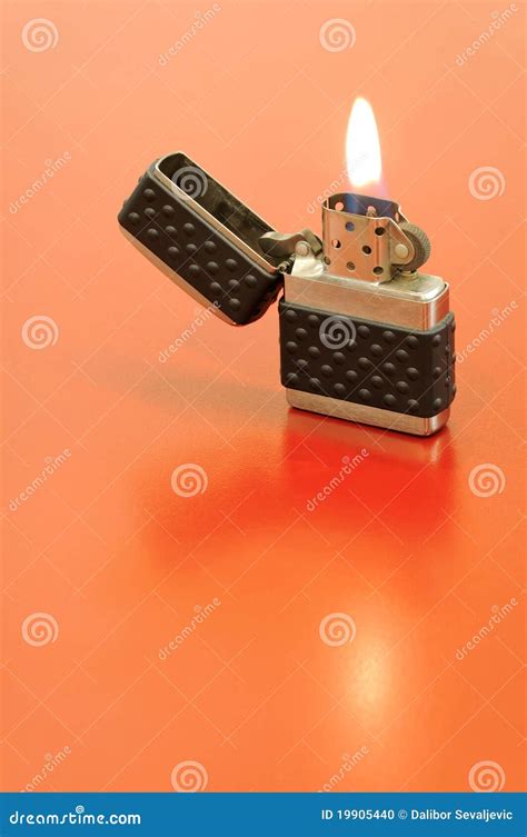 Zippo Lighter Closeup With Flame Royalty-Free Stock Photography ...