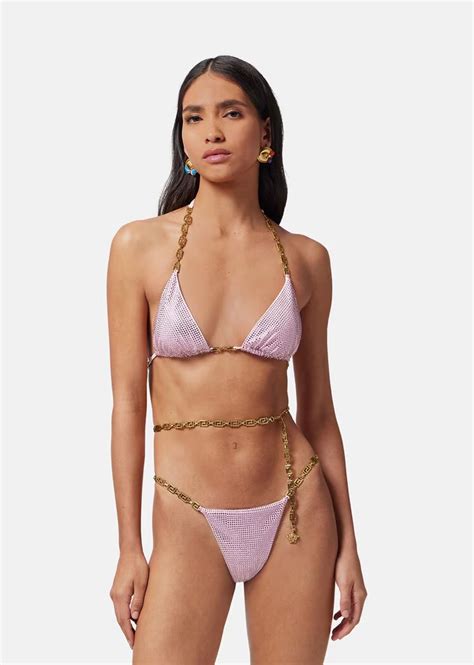 Dua Lipa matches her $4K blinged-out bikini to her convertible