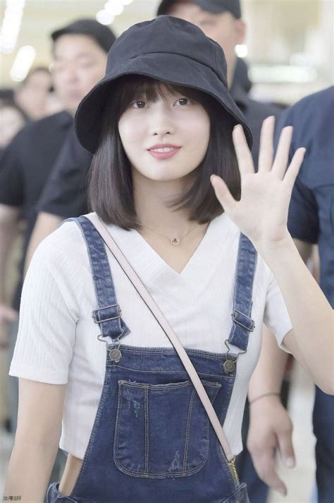 Download Hirai Momo In Black Bucket Hat Wallpaper | Wallpapers.com