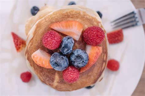 Pancakes With Strawberry, Blueberries, and Maple Syrup · Free Stock Photo