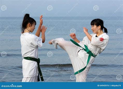 Japanese Karate Girls Training at the Beach Editorial Photo - Image of