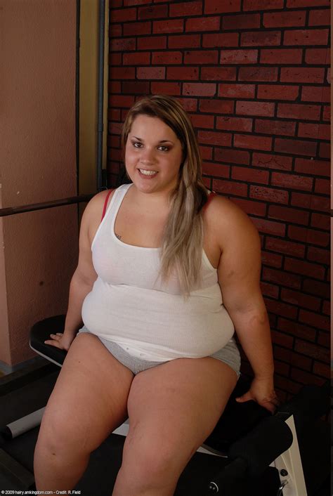 Fat Caucasian amateur teen Christina strips naked & touches her hairy