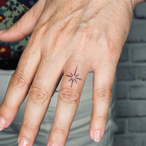 hand ring tattoos