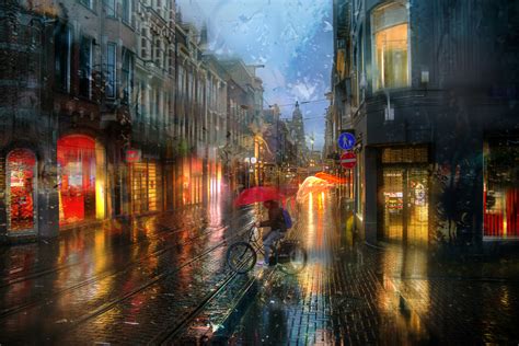 Фото Парень с зонтом на велосипеде под дождем, Амстердам, by Ed Gordeev