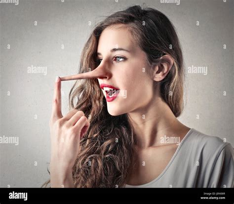 brunette woman  big nose lying stock photo alamy
