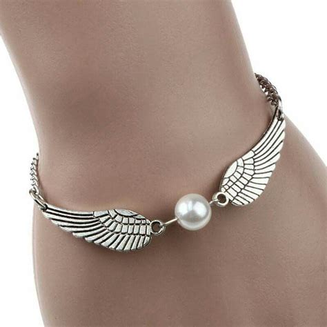 Pin by Linda Van Rooyen on bracelets | Winged bracelet, Angel wings ...