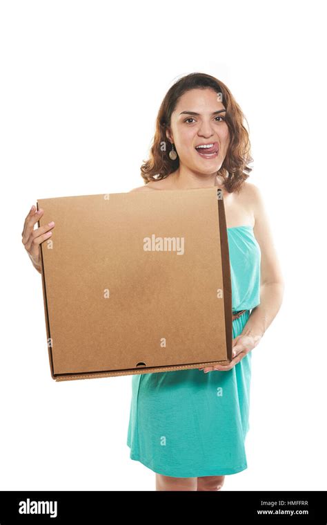 girl showing yummy pizza box on white background Stock Photo - Alamy