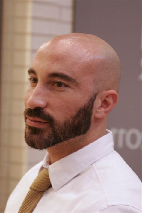 Men are debating the best bald fade styles online 16