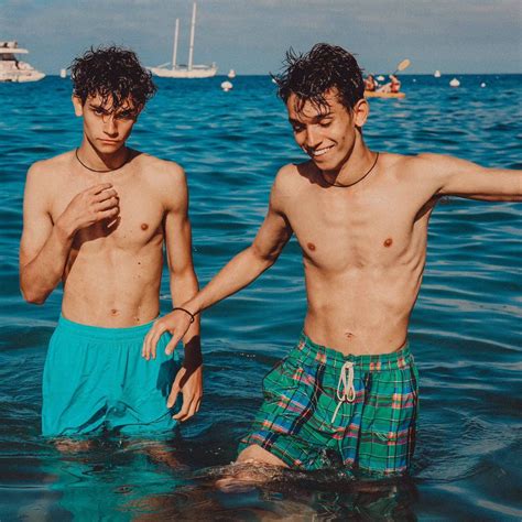 Download Dobre Brothers Twins On Water Wallpaper | Wallpapers.com
