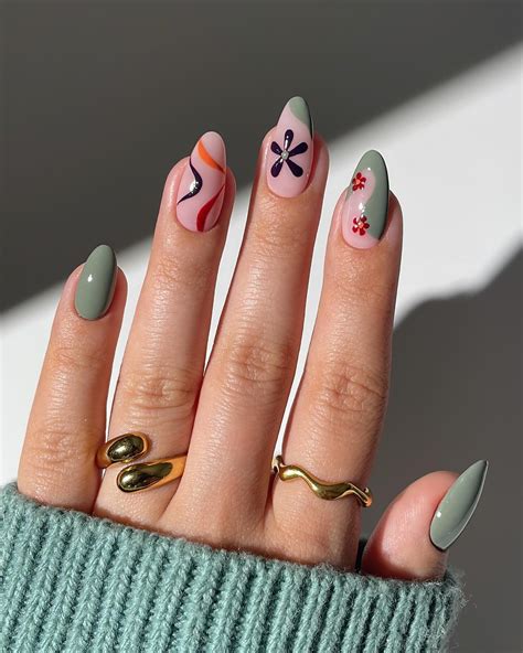 Fun and groovy nail art with muted colours🥹 swipe left for tutorial👀