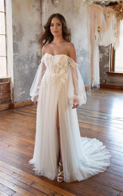wedding gown with off the shoulder sleeves 7