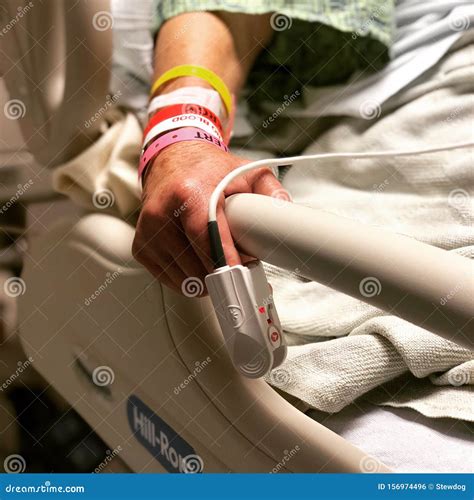 Hospital recovery editorial photo. Image of wristband - 156974496