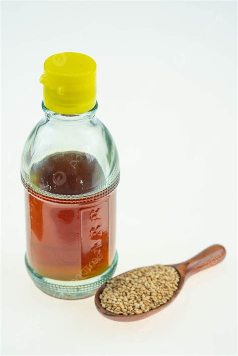 Sesame Oil Photography Background Wallpaper Image For Free Download