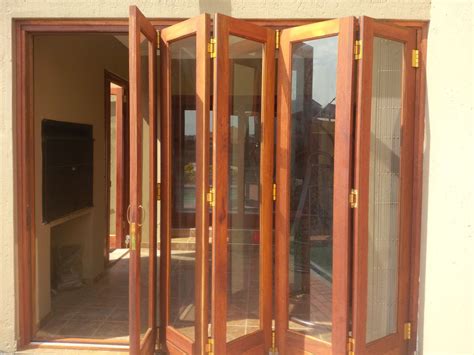 Wooden Folding Sliding Doors - Central Door Projects