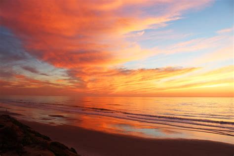pink sunset clouds beach