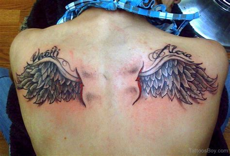 Gorgeous Wings Tattoo On Back - Tattoos Designs