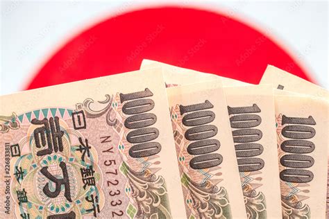 Japanese currency notes , Japanese Yen on japanese flag. Stock Photo ...