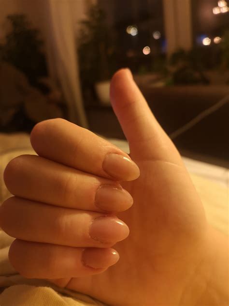 Why do my ends look oily and scraggly after awhile when I use a curling