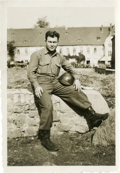 John Janik sitting outside on stone wall, ETO | The Digital Collections ...