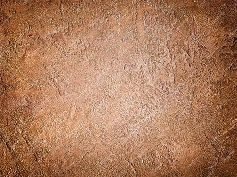 Premium Photo | Texture of old wall with decorative plaster brown colors.