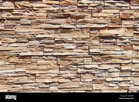 Stacked stone wall background horizontal Stock Photo - Alamy