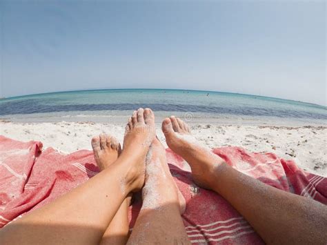 naked couple sunbathing beach stock   royalty  stock