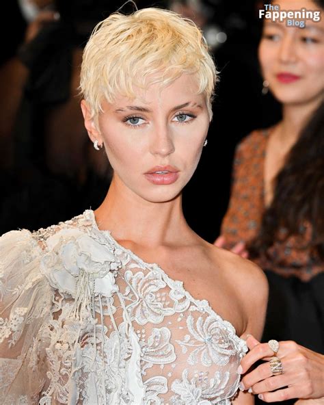 Iris Law Shows Off Her Nude Tits at the 77th Annual Cannes Film