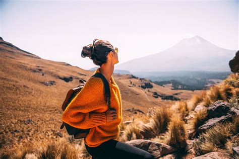 Download Girl Travelling Through A Mountain Picture | Wallpapers.com