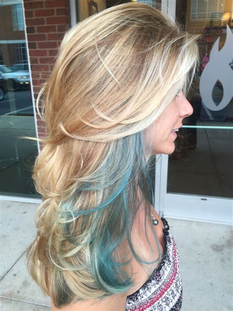 Long layers blonde balayage with a teal streak | Hair streaks blonde