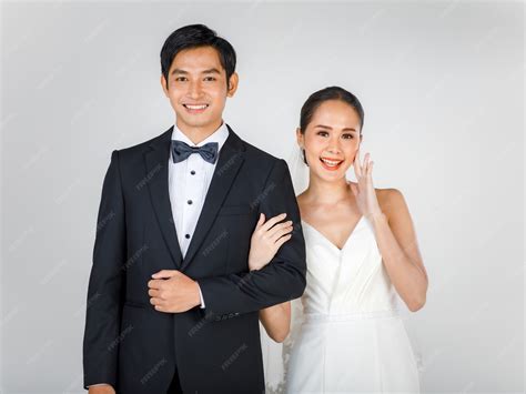 Premium Photo | Young attractive Asian couple, bride and groom, woman